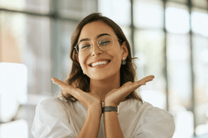Woman smiling after orthodontic treatment in Lake Worth, FL